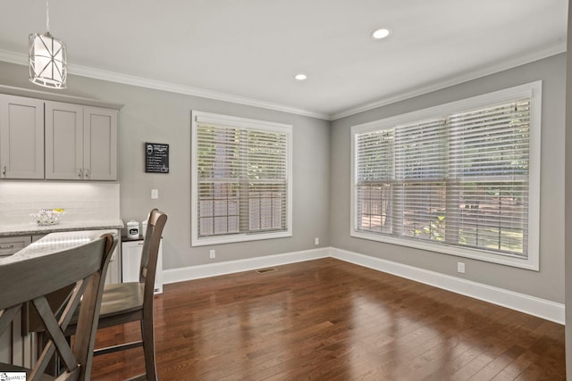 203 Piper Glen Ln, Inman, SC 29349 - dining room with ornamental molding, dark wood-type flooring, and recessed lighting