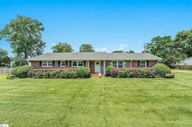 106 Thackston St, Fountain Inn, SC 29644 - ranch-style home with brick siding and a front yard