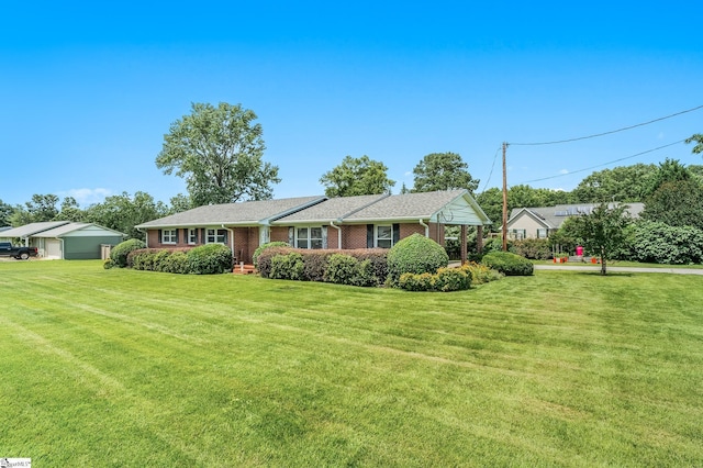 106 Thackston St, Fountain Inn, SC 29644 - single story home featuring brick siding, a front yard, and a detached garage