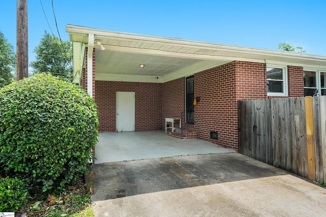 106 Thackston St, Fountain Inn, SC 29644 - view of patio / terrace featuring driveway and an attached carport