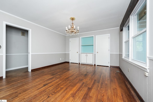 106 Thackston St, Fountain Inn, SC 29644 - unfurnished bedroom with a chandelier, wood finished floors, and crown molding