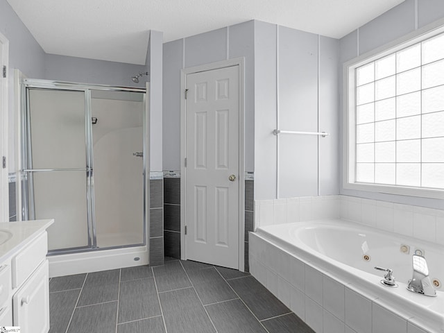 68 Arbours W Ln, Moore, SC 29369 - bathroom with a whirlpool tub, a shower stall, vanity, and tile patterned floors
