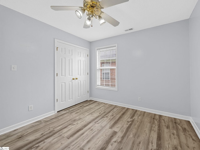 68 Arbours W Ln, Moore, SC 29369 - unfurnished bedroom featuring wood finished floors, a closet, and ceiling fan