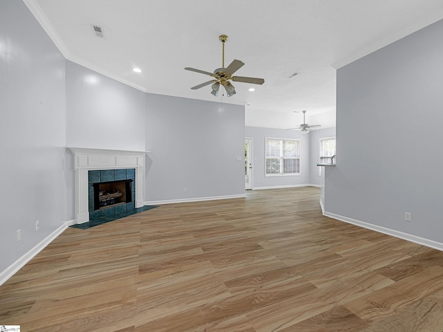 68 Arbours W Ln, Moore, SC 29369 - unfurnished living room featuring ceiling fan, light wood-style flooring, ornamental molding, recessed lighting, and a fireplace