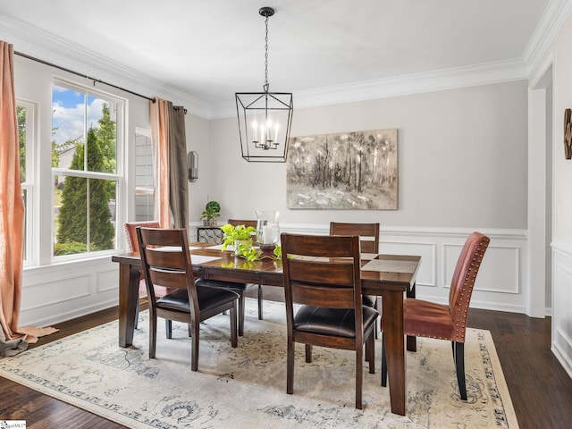 711 Hatwood Ct, Duncan, SC 29334 - dining area featuring a chandelier, plenty of natural light, ornamental molding, wood finished floors, and wainscoting