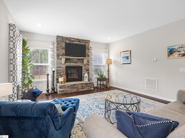 711 Hatwood Ct, Duncan, SC 29334 - living area with wood finished floors, a stone fireplace, and recessed lighting