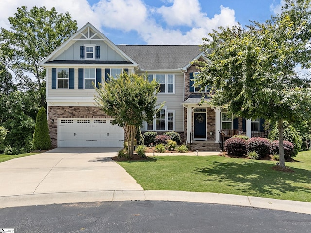 711 Hatwood Ct, Duncan, SC 29334 - craftsman house with board and batten siding, driveway, an attached garage, and a front lawn