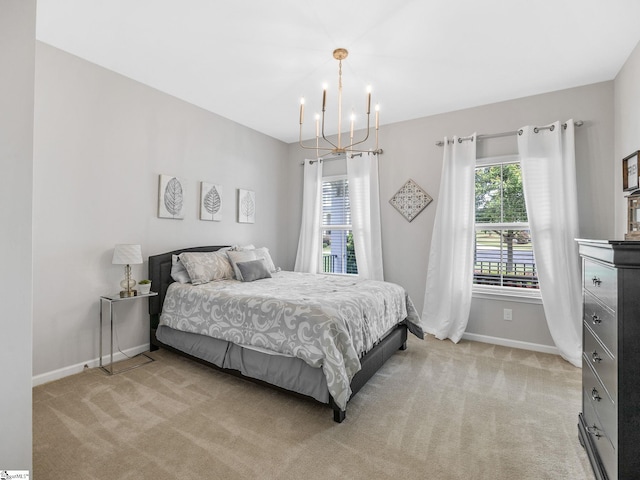 711 Hatwood Ct, Duncan, SC 29334 - bedroom with a chandelier and light carpet