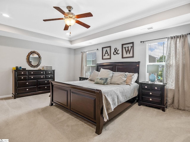 711 Hatwood Ct, Duncan, SC 29334 - bedroom with light colored carpet, multiple windows, crown molding, a raised ceiling, and a ceiling fan