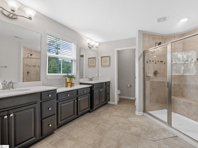 711 Hatwood Ct, Duncan, SC 29334 - full bathroom with double vanity, a shower stall, and tile patterned floors