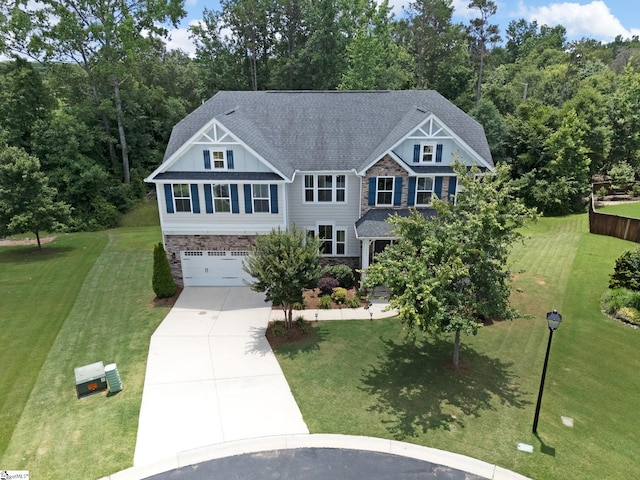 711 Hatwood Ct, Duncan, SC 29334 - craftsman inspired home with concrete driveway, a garage, a front lawn, and roof with shingles