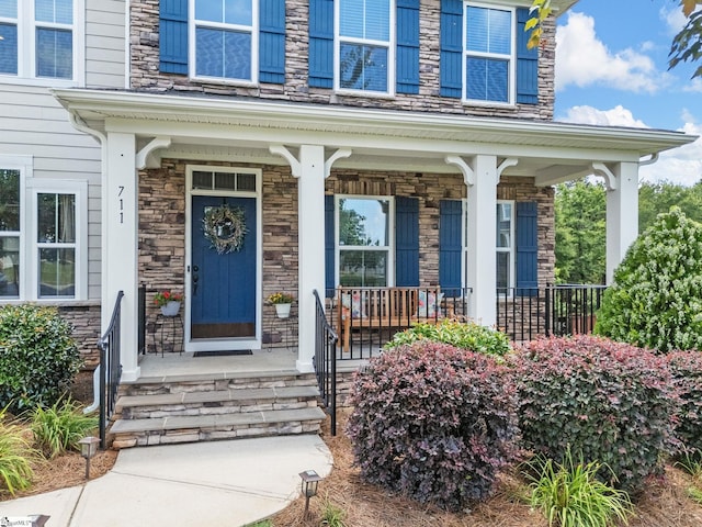 711 Hatwood Ct, Duncan, SC 29334 - entrance to property featuring stone siding and covered porch