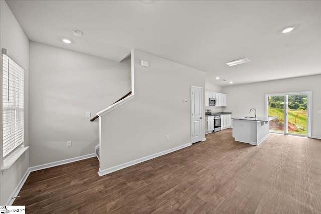 217 Islay Way, Anderson, SC 29621 - unfurnished living room featuring wood finished floors, stairs, and recessed lighting