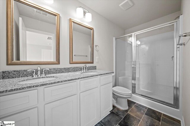 217 Islay Way, Anderson, SC 29621 - full bath with a stall shower, double vanity, and stone finish flooring