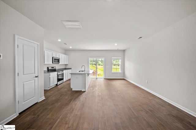 217 Islay Way, Anderson, SC 29621 - kitchen featuring appliances with stainless steel finishes, dark wood-type flooring, white cabinets, a kitchen island with sink, and open floor plan
