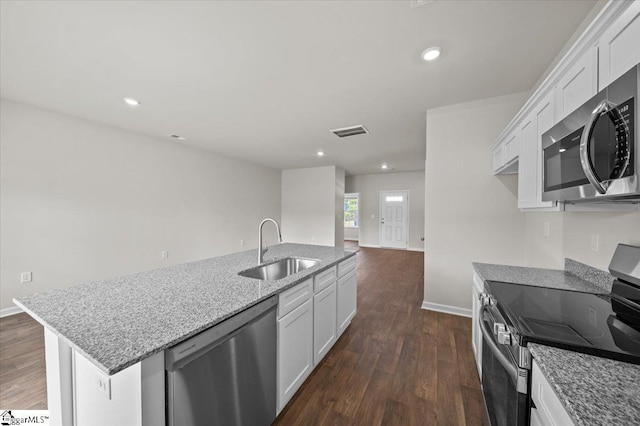 217 Islay Way, Anderson, SC 29621 - kitchen with appliances with stainless steel finishes, dark wood-type flooring, white cabinetry, light stone countertops, and recessed lighting