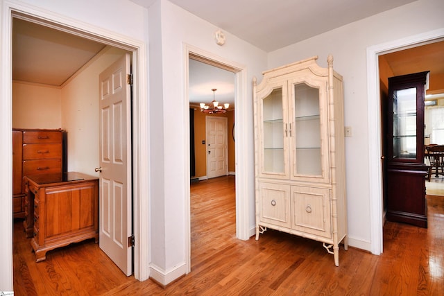 204 Jasper St, Easley, SC 29640 - corridor featuring a chandelier and wood finished floors