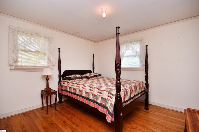 204 Jasper St, Easley, SC 29640 - bedroom with multiple windows and wood finished floors