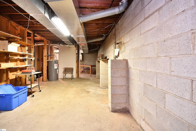 204 Jasper St, Easley, SC 29640 - unfinished below grade area featuring water heater and concrete block wall