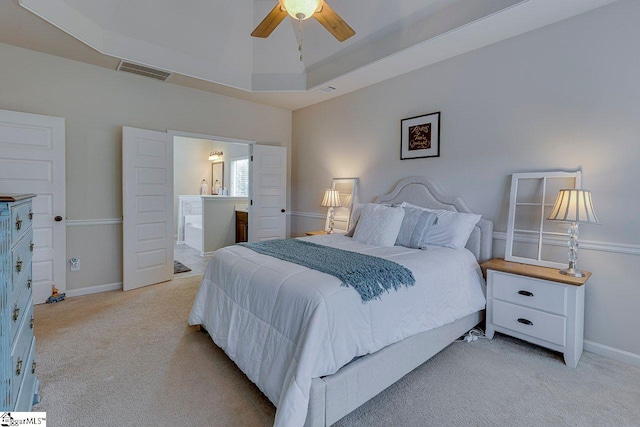 104 Saddlehorn Ln, Easley, SC 29642 - bedroom with light carpet, a raised ceiling, ensuite bath, and ceiling fan
