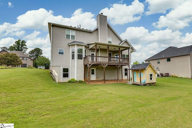 104 Saddlehorn Ln, Easley, SC 29642 - rear view of property with a shed, a chimney, a yard, and a wooden deck