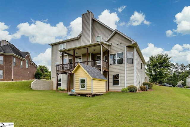 104 Saddlehorn Ln, Easley, SC 29642 - rear view of property featuring a lawn and a chimney