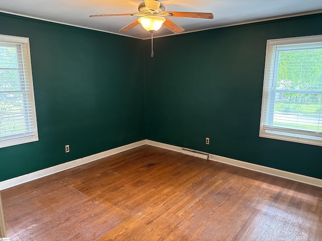 2 Runion Dr, Taylors, SC 29687 - spare room with wood finished floors, ceiling fan, and crown molding