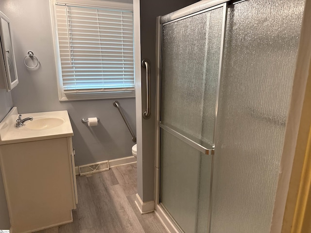 2 Runion Dr, Taylors, SC 29687 - full bath with a stall shower, wood finished floors, and vanity