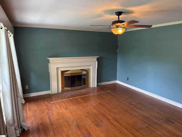 2 Runion Dr, Taylors, SC 29687 - unfurnished living room with a ceiling fan, a tiled fireplace, wood finished floors, and ornamental molding