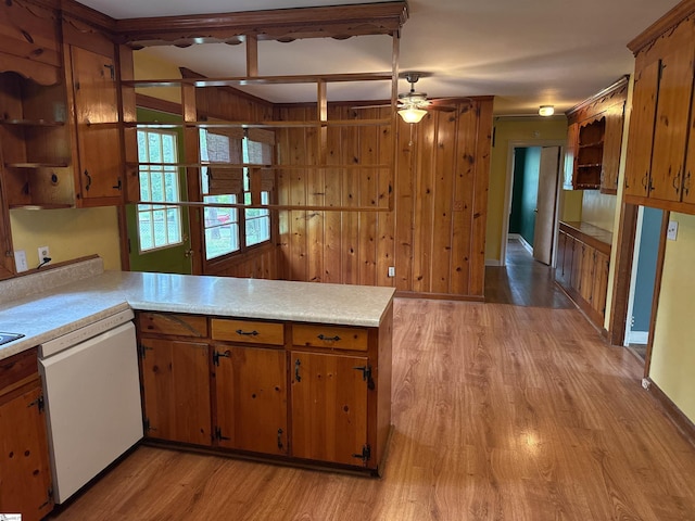 2 Runion Dr, Taylors, SC 29687 - kitchen featuring white dishwasher, open shelves, light countertops, a peninsula, and wooden walls