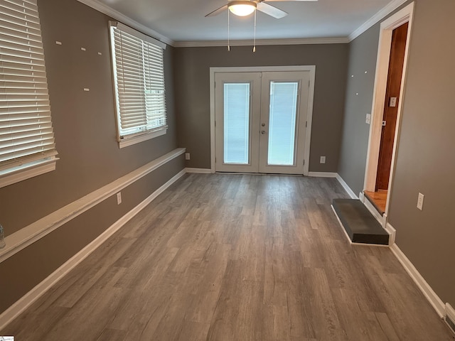 2 Runion Dr, Taylors, SC 29687 - entryway featuring ceiling fan, wood finished floors, crown molding, and french doors