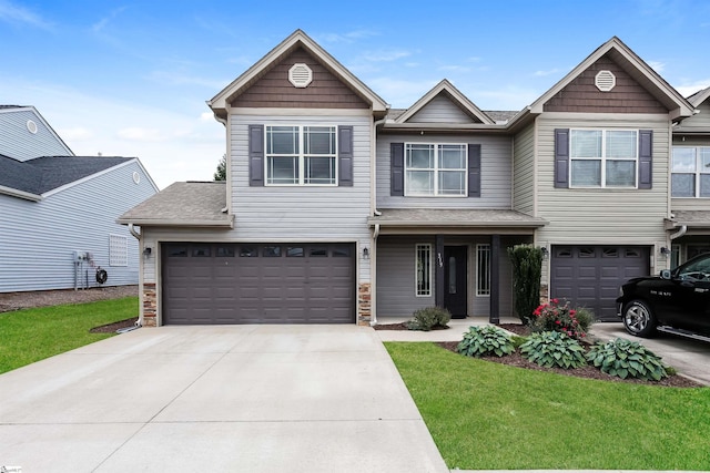 319 Aniken Cir, Boiling Springs, SC 29316 - view of front facade with a garage, concrete driveway, a front yard, and roof with shingles
