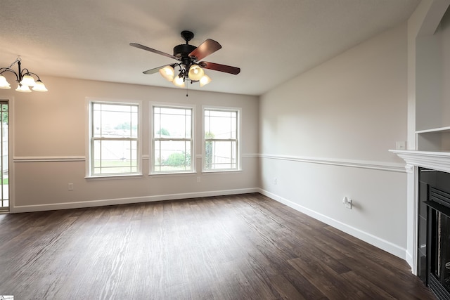 319 Aniken Cir, Boiling Springs, SC 29316 - unfurnished living room with a fireplace, dark wood-type flooring, and plenty of natural light
