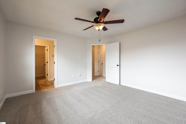 319 Aniken Cir, Boiling Springs, SC 29316 - unfurnished bedroom featuring carpet floors, a spacious closet, ceiling fan, and a closet