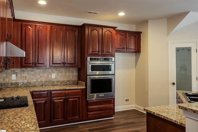 515 Etowah Dr, Roebuck, SC 29376 - kitchen featuring stainless steel double oven, black electric cooktop, ventilation hood, dark wood finished floors, and decorative backsplash