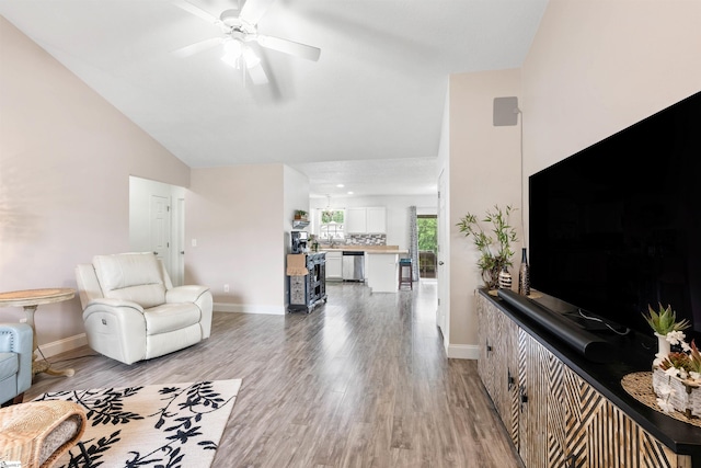 640 Slippery Moss Dr, Spartanburg, SC 29303 - living room featuring a ceiling fan, light wood-style flooring, and lofted ceiling
