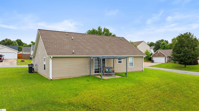 640 Slippery Moss Dr, Spartanburg, SC 29303 - rear view of house with a yard, a patio area, and roof with shingles