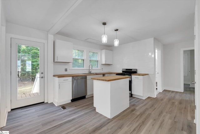 721 Central St, Iva, SC 29655 - kitchen with butcher block countertops, appliances with stainless steel finishes, plenty of natural light, and light wood-style flooring