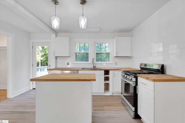 721 Central St, Iva, SC 29655 - kitchen featuring butcher block counters, stainless steel appliances, and white cabinetry