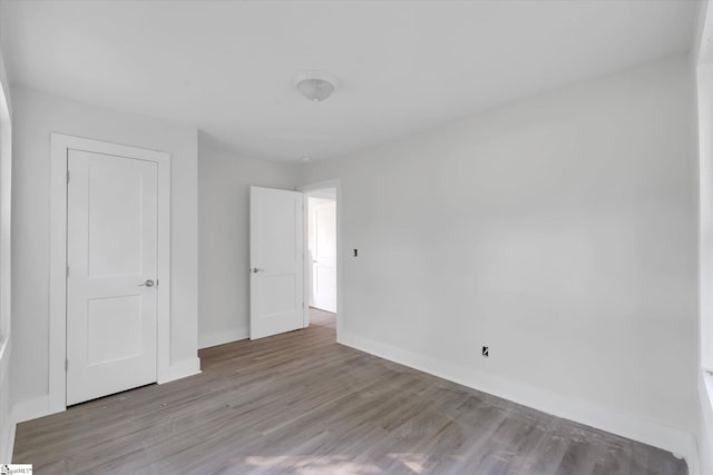 721 Central St, Iva, SC 29655 - unfurnished bedroom featuring baseboards and wood finished floors