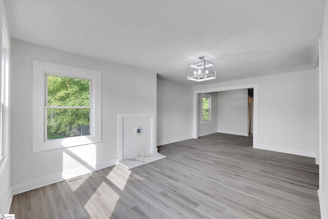 721 Central St, Iva, SC 29655 - empty room featuring wood finished floors and a chandelier