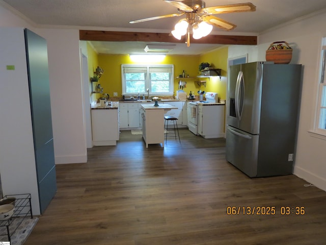 2551 Compton Bridge Rd, Inman, SC 29349 - kitchen featuring stainless steel fridge with ice dispenser, white electric stove, freestanding refrigerator, ornamental molding, and white cabinets