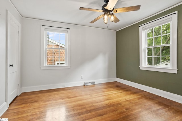 2608 Lane Ave, Anderson, SC 29621 - unfurnished room featuring healthy amount of natural light, light wood-type flooring, crown molding, and ceiling fan