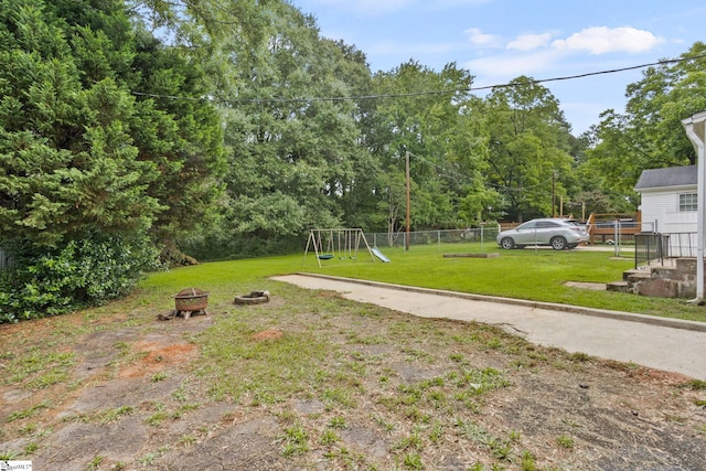 2608 Lane Ave, Anderson, SC 29621 - view of yard with a playground and an outdoor fire pit