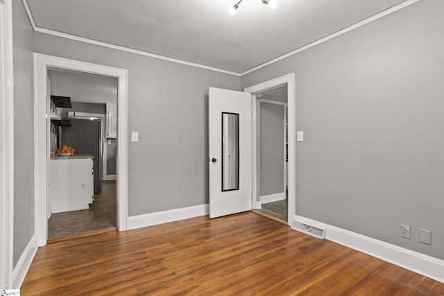 2608 Lane Ave, Anderson, SC 29621 - unfurnished bedroom featuring wood finished floors and crown molding