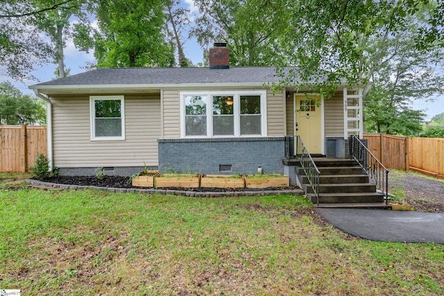 509 Montague St, Anderson, SC 29624 - view of front facade featuring crawl space and a chimney