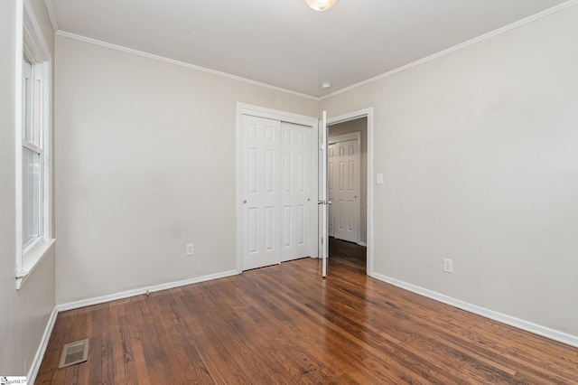 509 Montague St, Anderson, SC 29624 - unfurnished bedroom featuring wood finished floors, a closet, and crown molding