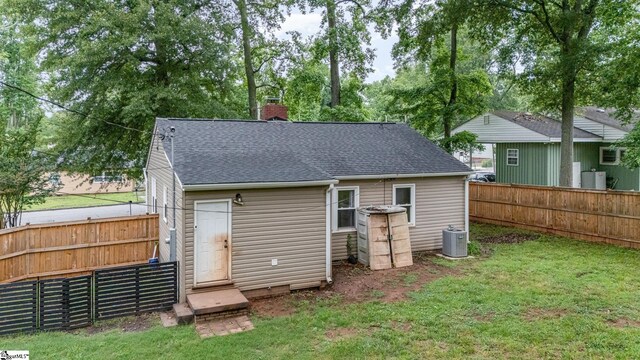 509 Montague St, Anderson, SC 29624 - rear view of property featuring a chimney and roof with shingles