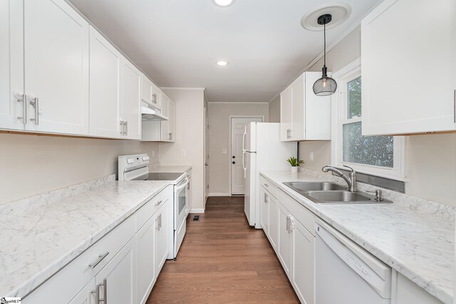 509 Montague St, Anderson, SC 29624 - kitchen featuring white appliances, white cabinets, ornamental molding, wood finished floors, and pendant lighting