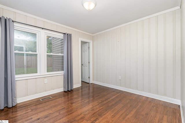 509 Montague St, Anderson, SC 29624 - spare room featuring ornamental molding and dark wood-style flooring